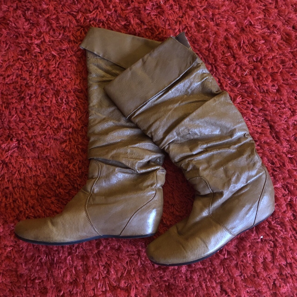 Brown calf height Steve Madden boots. Size 6.
